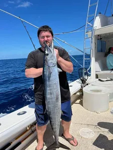 A angler holding a large wahoo fish in Florida