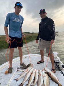Showing their inshore trophy at first catch
