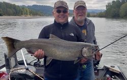 Two people fishing with a big 30-inch catch in Chehalis