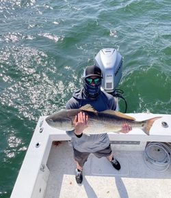 A person fishing in Norfolk