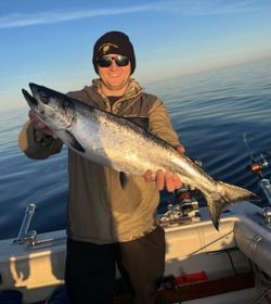 A person enjoying fishing in MI