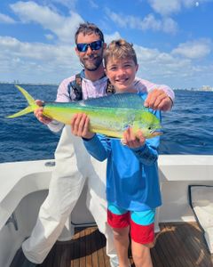 Two anglers fishing on a sunny day in FL
