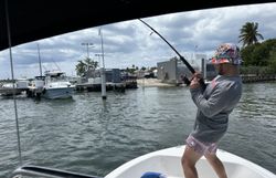 A person fishing in the water in PR