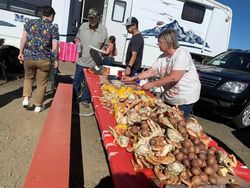 Three people enjoying fishing tours in Roseburg