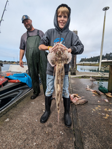 Great flatfish action at Winchester Bay! Perfect adventure fishing spot.