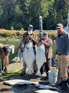 Two Pacific Halibut fish caught during fishing tour in OR