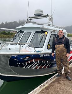 Angler fishing during outdoor adventure tour in Oregon