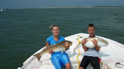 Two anglers with a great catch of fish at Fort Morgan