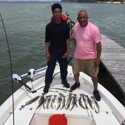 Two anglers fishing in Galveston