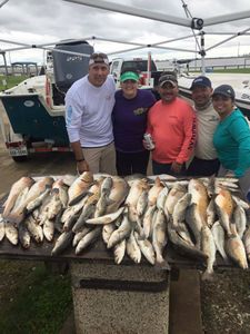 5 people fishing in TX