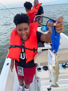 Two people fishing in Galveston