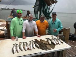 Five people fishing in Galveston
