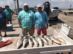 7 fishing rods and tackle with 3 people in Galveston, Texas