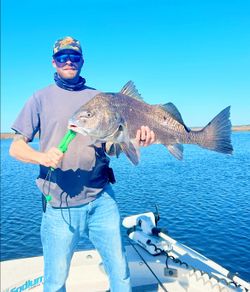 Angler fishing with rod and reel in Florida