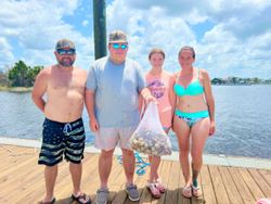 Four people enjoying fishing adventure in Old Town