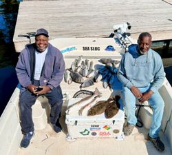Two people fishing on the coast of Florida