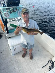Redfish caught while fishing in Old Town FL displayed on boat deck