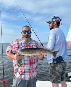 Redfish caught by two people in FL