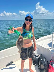 Southern flounder caught while fishing in Old Town FL displayed on boat deck