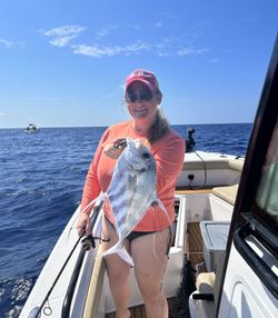 A man fishing for an African Pompano in Panama City