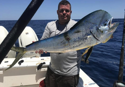 Angler posing with a 38 inch fish catch in Panama City