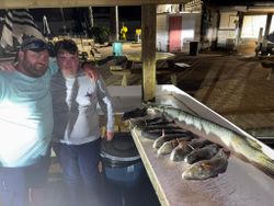 2 anglers with a large fish in Port O'Connor
