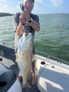 A person fishing in Port O'Connor