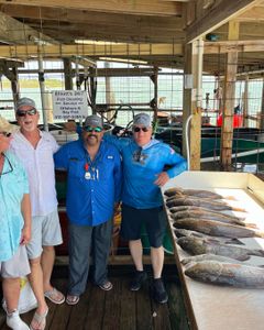 4 people fishing in TX