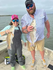 Two redfish caught during a fishing trip in TX