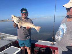 Big redfish and big smiles on the water!