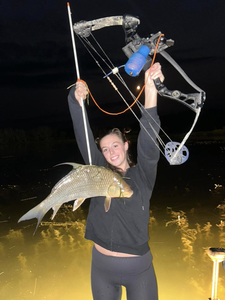 A single angler fishing in Elk Rapids