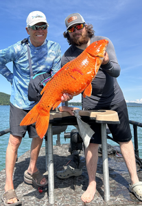 Couple enjoying fishing trip in Elk Rapids