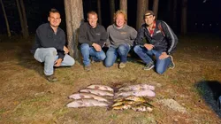 Four people fishing in MI