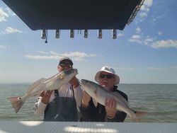 Two large redfish caught on a fishing tour in Florida