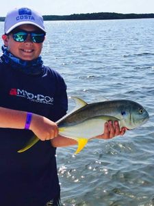 Crevalle Jack, a 12-inch fish, caught in Florida while fishing on a tour