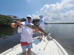 Angler with a massive 25-inch redfish caught in Florida