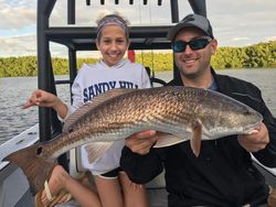Redfish, a 39-inch catch, reeled in during a fishing tour in Florida