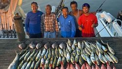 5 people fishing at Pensacola Beach