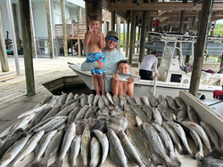 Four people fishing in St Bernard