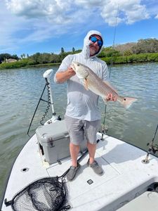 A redfish measuring 20 inches caught while fishing in Florida.