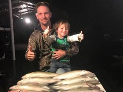 Two people enjoying a fishing trip in Leesburg