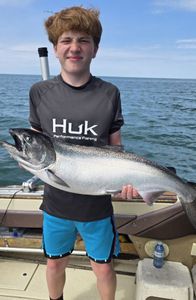 A person fishing for a chinook salmon in St. Catharines
