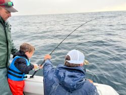 Two people fishing in Wanchese