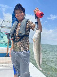 Chasing redfish in Port Isabel!
