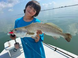 Proud Speckled Trout Catch