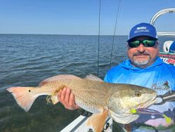 Angler with big fish caught at Port Isabel
