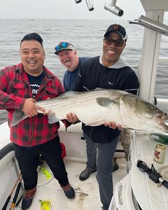 3 people fishing in Middletown Township