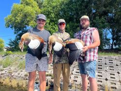 Three people enjoying a fishing and hunting adventure in FL