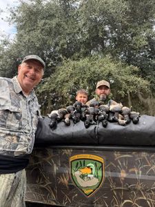 3 people enjoying fishing and hunting in FL