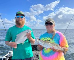 Two spotted weakfish, 18 inches, caught fishing in FL